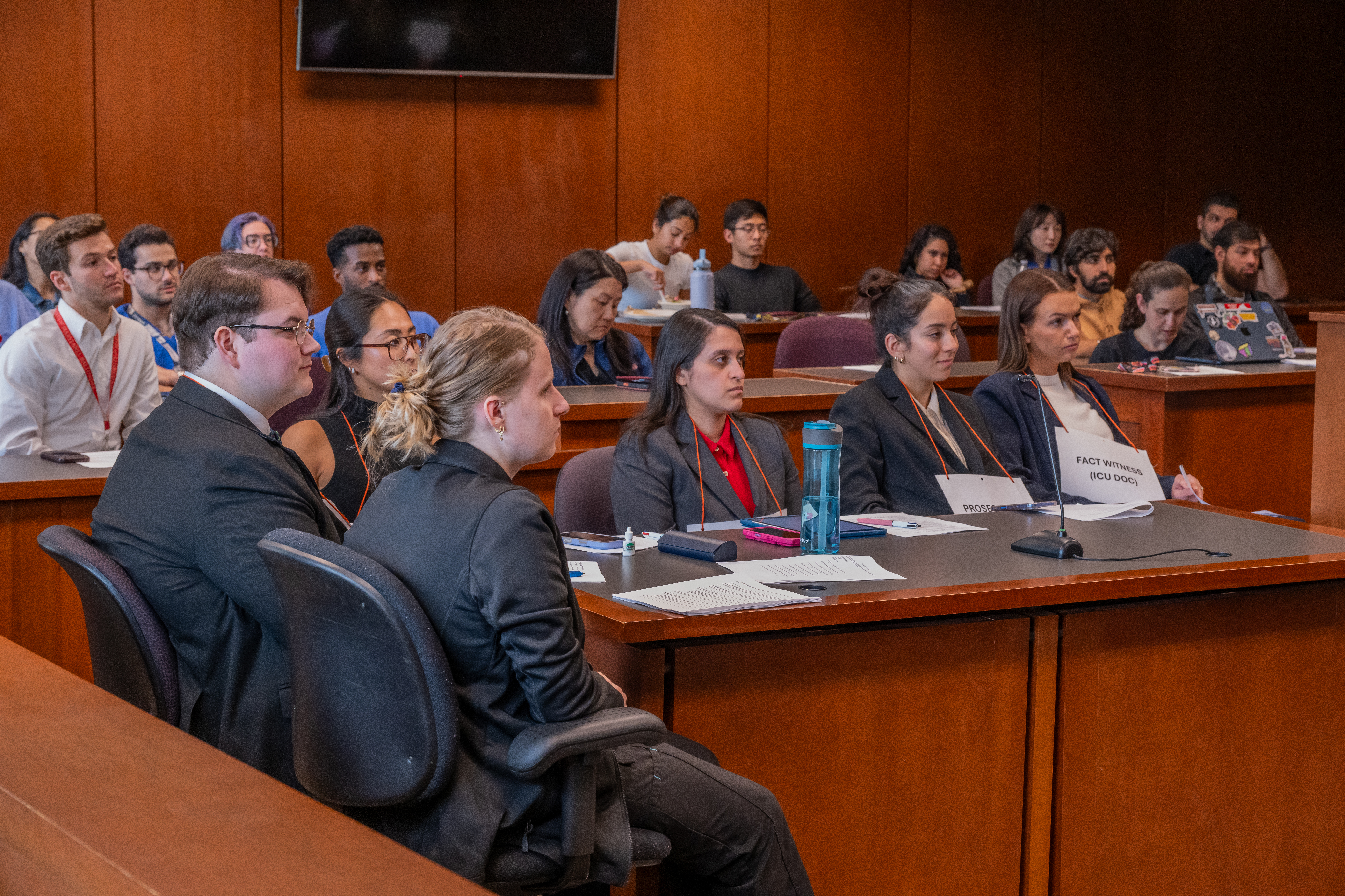 Med students gathered in courtroom for mock trial event