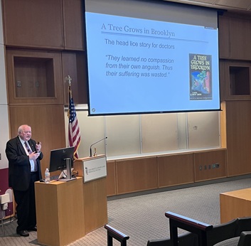 Dr. Earl Reisdorff lectures to the Department of Emergency Medicine's Residents, faculty and staff